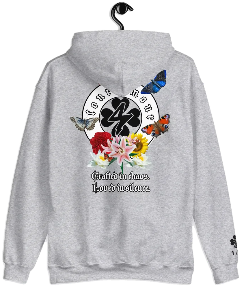 Phase IV Hoodie in Concrete Calm gray: back view with the Crafted in chaos butterfly and flower print